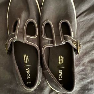 TOMS sneakers with buckle. Worn a couple of times.